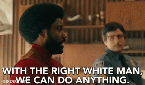 Bearded Man Next To Police Officer Saying With The Right White Man We Can Do Anything GIF