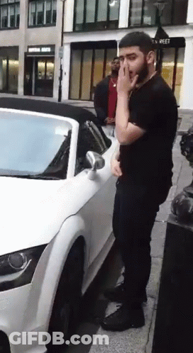 Bearded Man Next To White Sports Car GIF