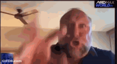 Bearded Man On Madmax World Screen GIF