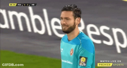 Bearded Man On Soccer Field In Front Of Amble Esp Banner GIF