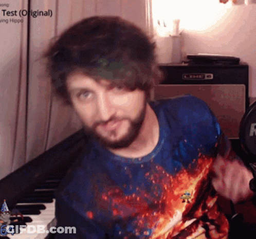 Bearded Man Playing Guitar With Keyboard Saying 64 GIF
