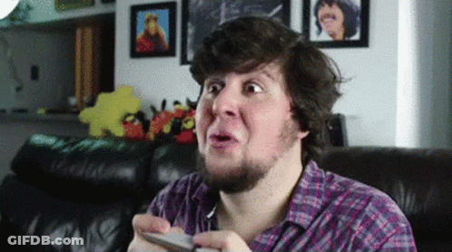 Bearded Man Playing Video Game Making A Face GIF