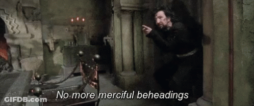 Bearded Man Pointing In Dark Room GIF