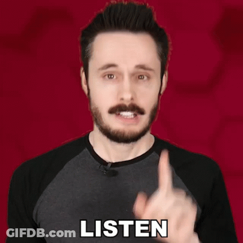 Bearded Man Pointing Up Wearing Listen Shirt GIF