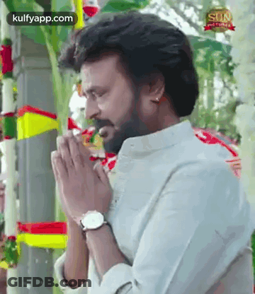 Bearded Man Praying At Temple GIF