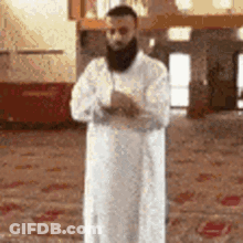 Bearded Man Praying In Mosque With Hands Folded GIF