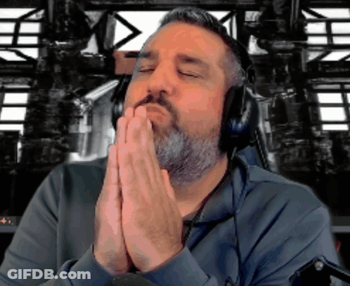 Bearded Man Praying With Headphones GIF