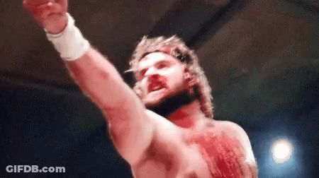 Bearded Man Raising Fist GIF