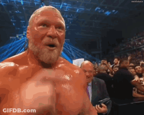 Bearded Man Raising Hands In Crowd GIF