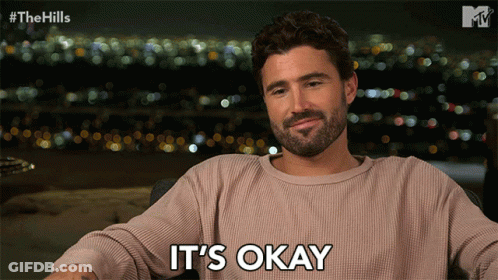 Bearded Man Saying It's Okay In City GIF