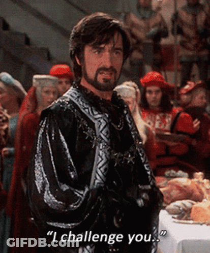 Bearded Man Says I Challenge You At Food Table GIF