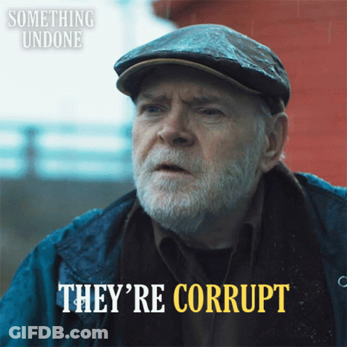 Bearded Man Says They're Corrupt In Yellow Letters GIF