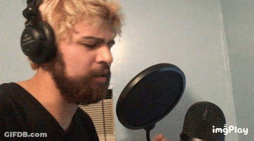 Bearded Man Singing Into Microphone GIF