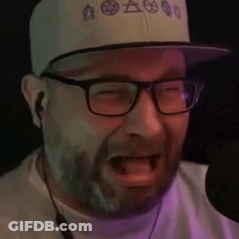 Bearded Man Singing Into Microphone GIF