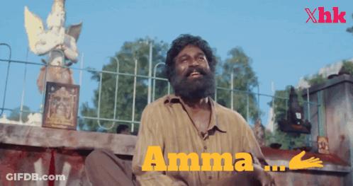 Bearded Man Sitting At Fence Saying Amma GIF