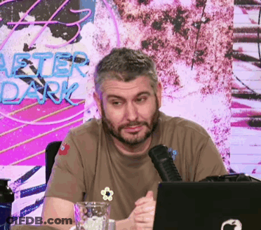 Bearded Man Sitting At Laptop After Dark Sign GIF