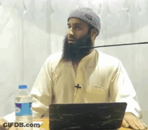 Bearded Man Sitting At Laptop With Aquafina Water GIF