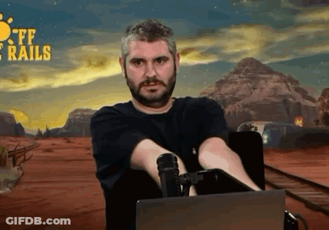 Bearded Man Sitting At Laptop With Microphone FF Rails GIF
