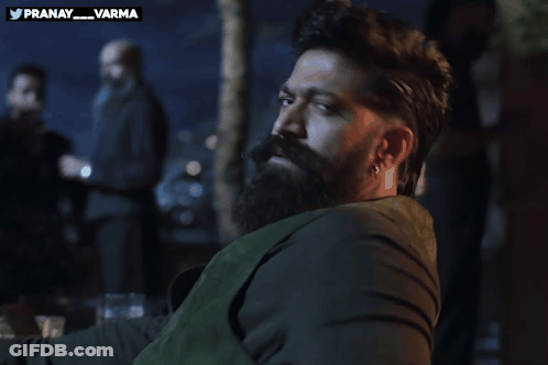 Bearded Man Sitting At Pranay Varma Sign GIF