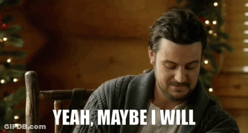 Bearded Man Sitting In Chair Saying Yeah Maybe I Will GIF