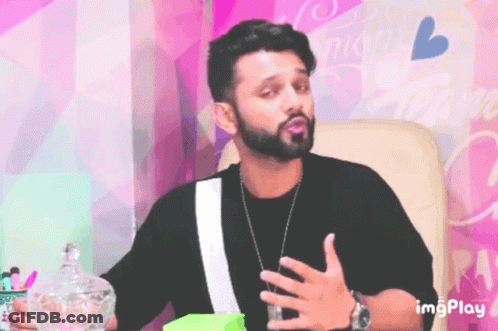 Bearded Man Sitting In Front Of Pink Wall Imgplay GIF