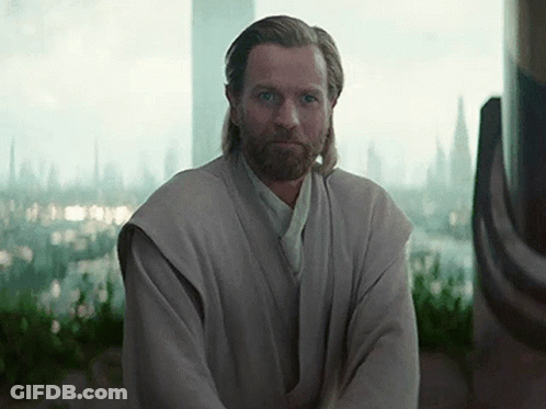 Bearded Man Sitting In Front Of Window GIF