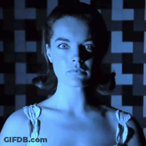 Bearded Man Sitting In Front Of Woman Pointing Finger GIF