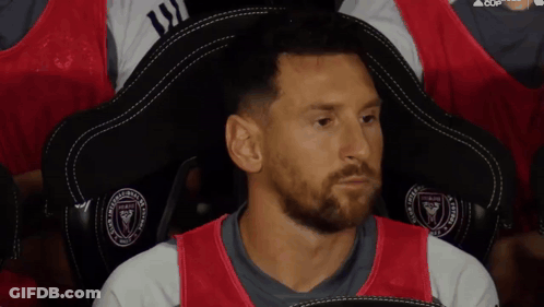 Bearded Man Sitting In Miami Chair GIF
