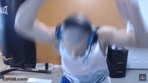 Bearded Man Sitting In White Truck Talking On Cell Phone GIF