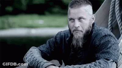 Bearded Man Sitting On Boat Arms Crossed GIF