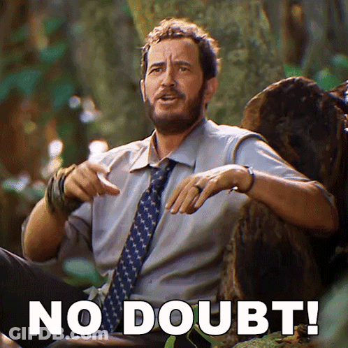 Bearded Man Sitting On Rock Saying No Doubt GIF