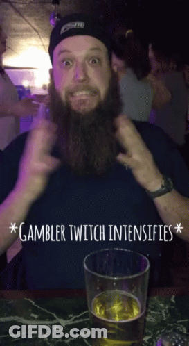 Bearded Man Sitting With Beer Gambler Twitch Intensifies GIF