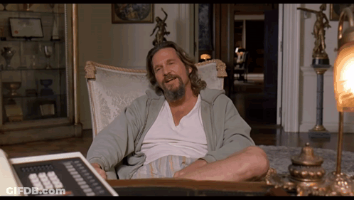 Bearded Man Sitting With Calculator GIF
