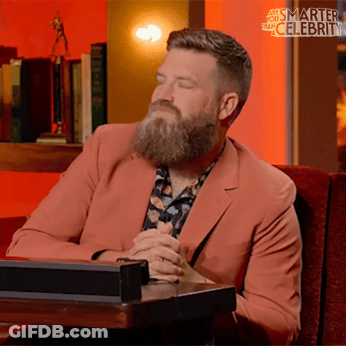 Bearded Man Sitting With Eyes Closed Smarter Than Celebrity GIF