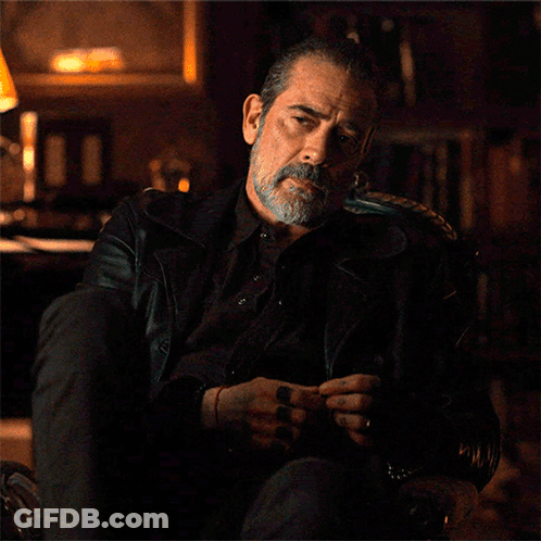 Bearded Man Sitting With Folded Hands GIF