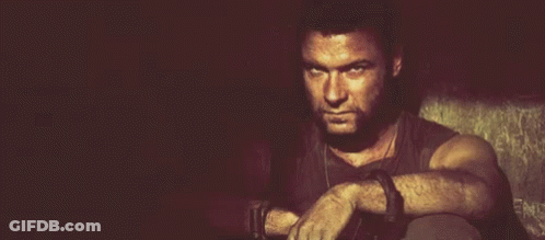 Bearded Man Sitting With Hands On Knees GIF