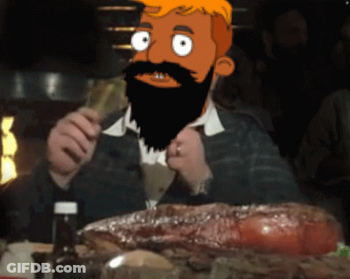Bearded Man Sitting With Large Piece Of Meat GIF