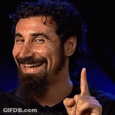 Bearded Man Smiling And Pointing Up GIF