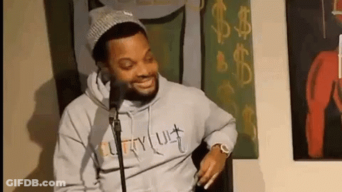 Bearded Man Smiling At Microphone GIF