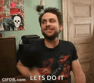 Bearded Man Smiling In Black Shirt GIF