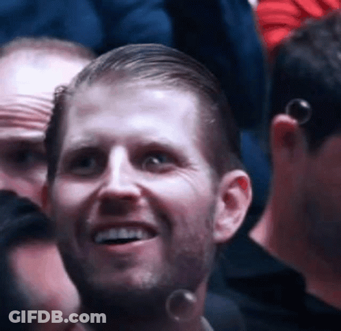 Bearded Man Smiling In Crowd GIF