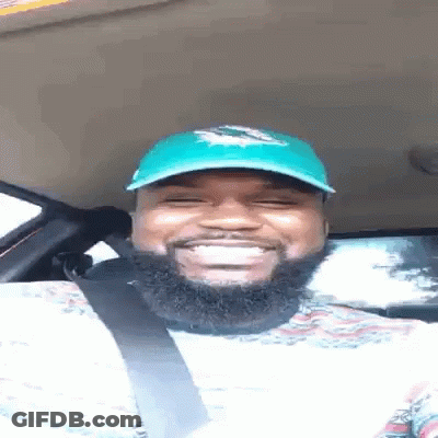 Bearded Man Smiling In Dolphins Hat GIF