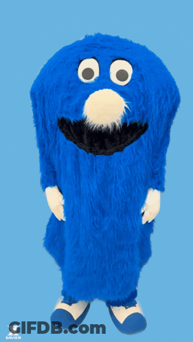 Bearded Man Smiling In Front Of Crowd GIF