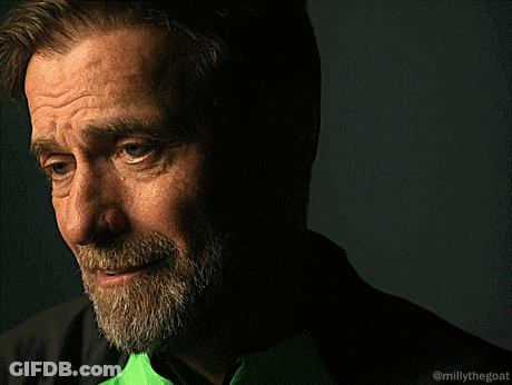 Bearded Man Smiling In Green Shirt GIF