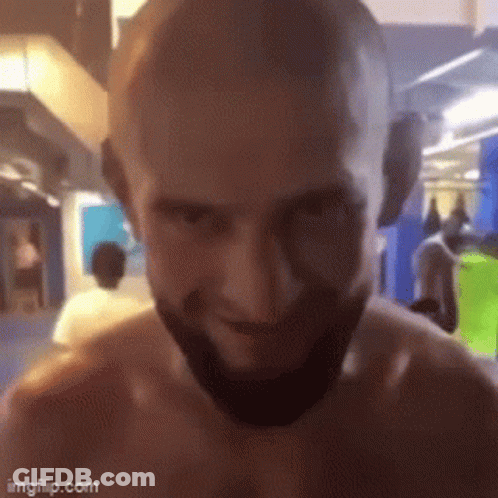 Bearded Man Smiling In Gym GIF