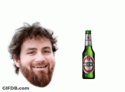 Bearded Man Smiling Next To Becks Beer GIF