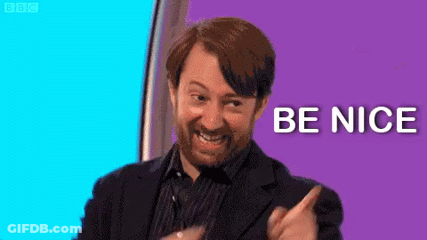 Bearded Man Smiling Pointing Be Nice GIF