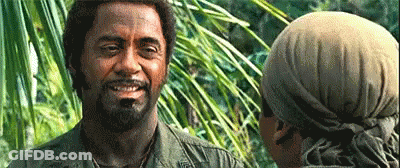 Bearded Man Smiling Talking In Jungle GIF