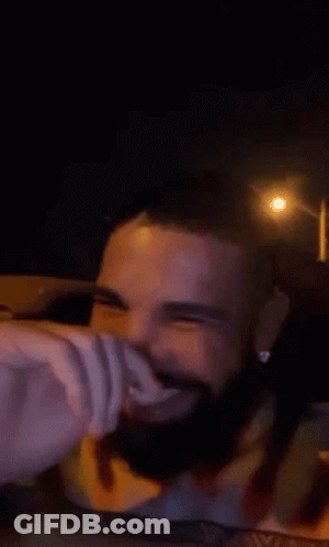 Bearded Man Smiling While Driving GIF