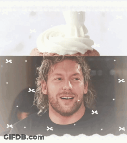 Bearded Man Smiling With Cupcake On Head GIF